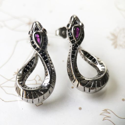 Embody the mystery of the 13th sign with our luxurious Ophiuchus silver earrings